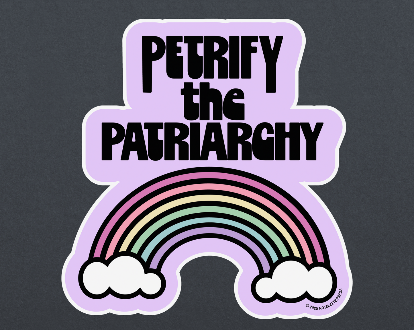Sticker with rainbow and text 'Petrify the Patriarchy' on a dark background
